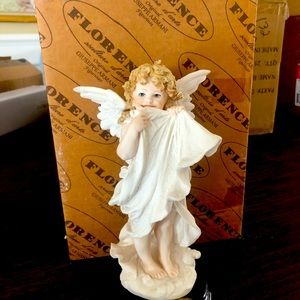 Armani statue “heavens gift”